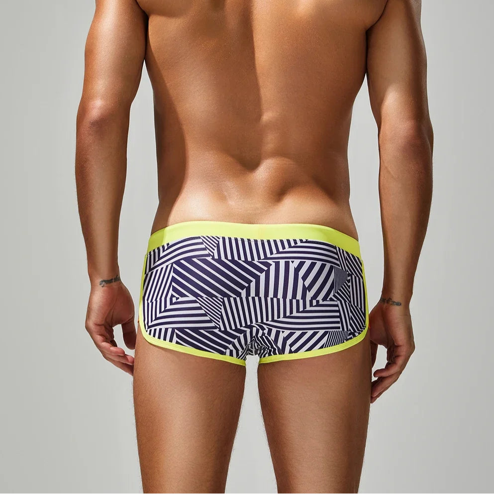 a sexy man in yellow side SEOBEAN Men’s Obey the Stripe Low Rise Swim Trunks – pridevoyageshop.com – gay men’s sexy swim briefs, trunks, board shorts, and bikinis