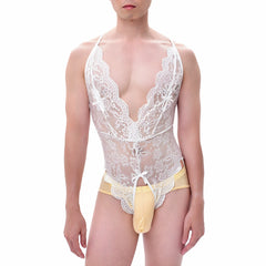 a sexy man wearing a white Mother’s Boudoir Lace Teddy, soft lace details, plunging neckline, feminine-inspired fetish lingerie – pridevoyageshop.com – gay men’s harness, lingerie and fetish wear