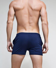 a hot gay man in dark blue Solid Skinny Sweat Shorts | Gay Loungewear & Shorts - pridevoyageshop.com - gay pajamas, gay loungewear, gay sleepwear