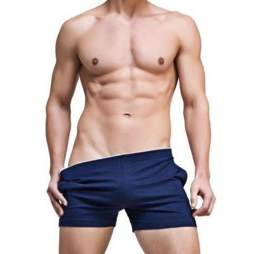 a hot gay man in dark blue Solid Skinny Sweat Shorts | Gay Loungewear & Shorts - pridevoyageshop.com - gay pajamas, gay loungewear, gay sleepwear