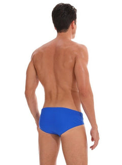 a sexy gay man in Men's Solid Blue Swim Briefs - pridevoyageshop.com - gay men’s underwear and swimwear