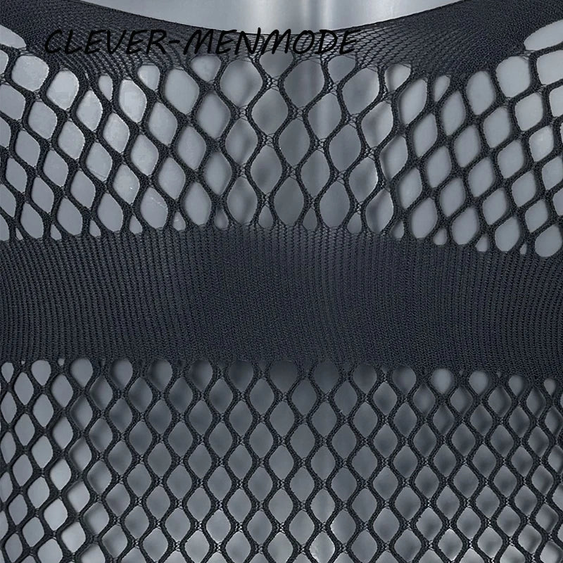black fishnet teddy flat lay with open chest and thong back design – pridevoyageshop.com – gay men’s harness, lingerie and fetish wear
