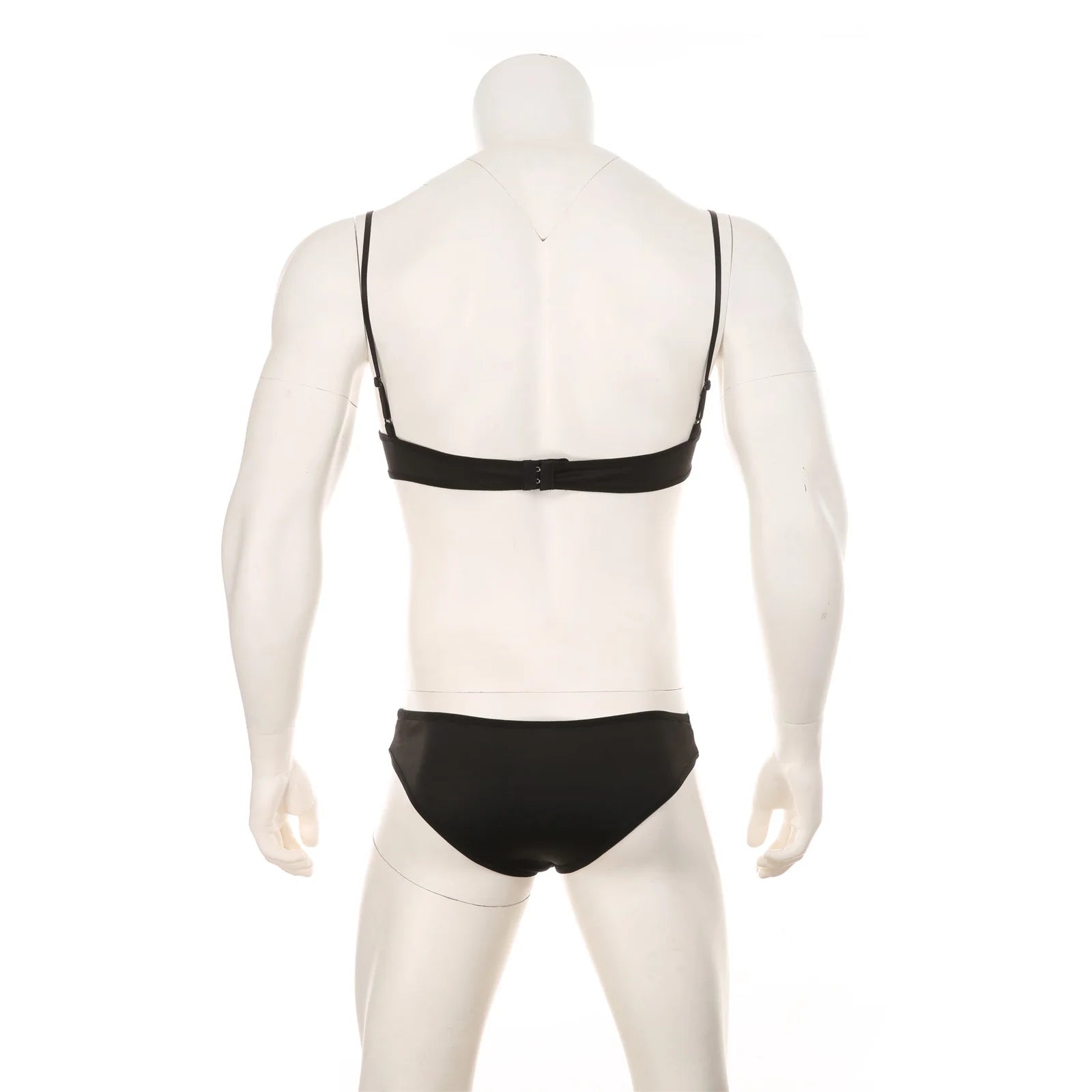 black lace Good Boy bralette and brief set flat lay, sheer floral lace, elastic trim, soft cupped top, cheeky bottoms – pridevoyageshop.com – gay men’s harness, lingerie and fetish wear