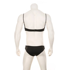 black lace Good Boy bralette and brief set flat lay, sheer floral lace, elastic trim, soft cupped top, cheeky bottoms – pridevoyageshop.com – gay men’s harness, lingerie and fetish wear