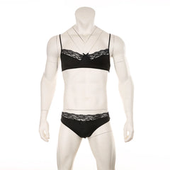 black lace Good Boy bralette and brief set flat lay, sheer floral lace, elastic trim, soft cupped top, cheeky bottoms – pridevoyageshop.com – gay men’s harness, lingerie and fetish wear