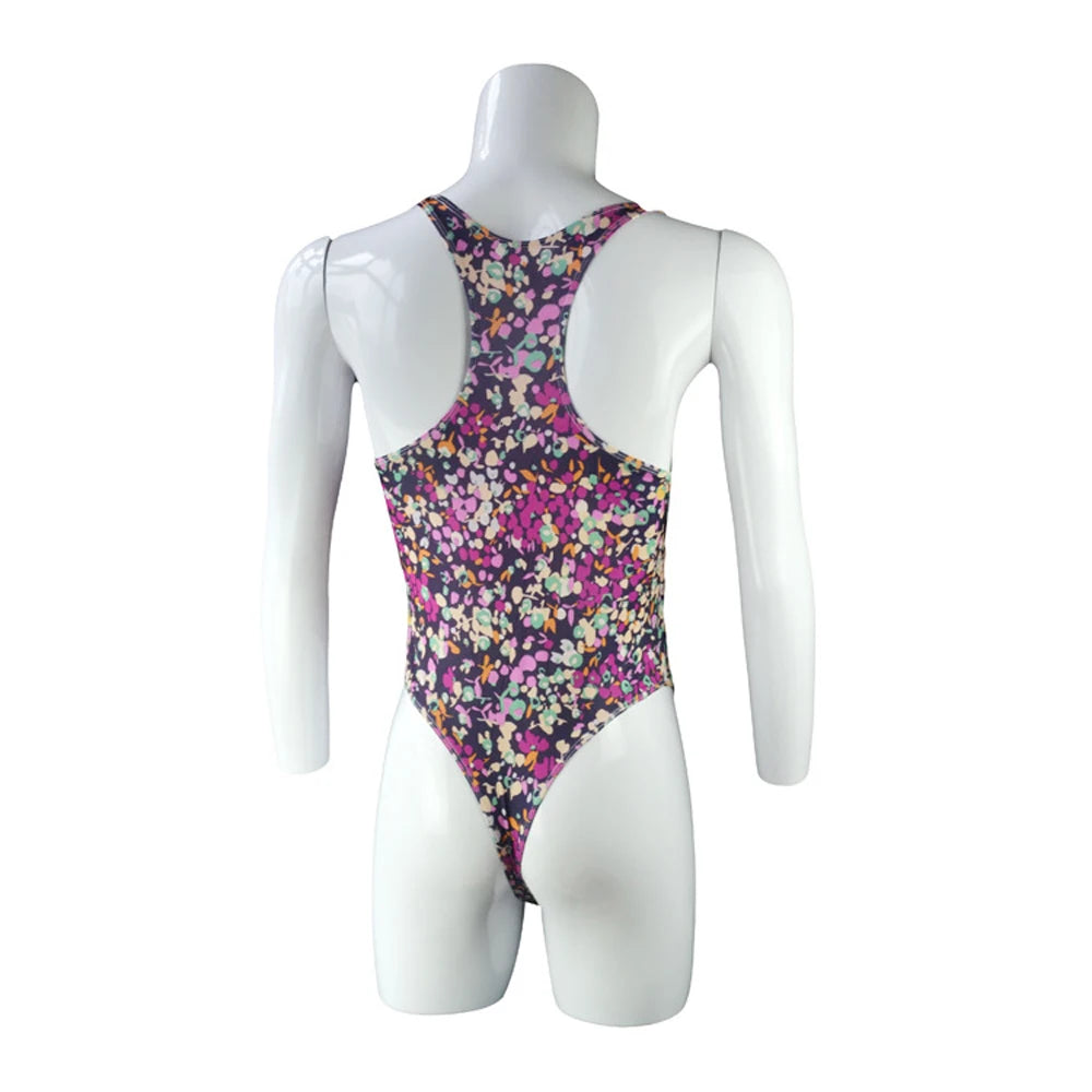 close-up of purple floral lace racerback bodysuit fabric and cut-out design – pridevoyageshop.com – gay men’s harness, lingerie and fetish wear