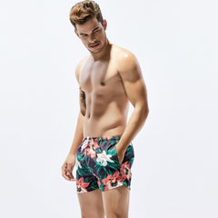 a hot man in dark Petal Play Board Shorts - pridevoyageshop.com - gay men’s underwear and swimwear