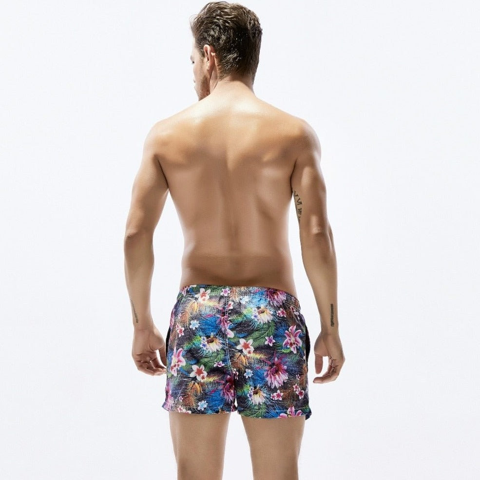 a hot man in light Petal Play Board Shorts - pridevoyageshop.com - gay men’s underwear and swimwear