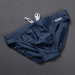 dark blue Desmiit Men’s Bulge Master Low Rise Swim Briefs - pridevoyageshop.com - gay men’s sexy swim briefs, trunks, board shorts, and bikinis