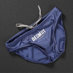 dark blue Desmiit Men’s Sleek Statement Swim Briefs - pridevoyageshop.com - gay men’s sexy swim briefs, trunks, board shorts, and bikinis