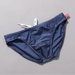 dark blue Men’s Tease-Me Minimal Swim Briefs - pridevoyageshop.com - gay men’s sexy swim briefs, trunks, board shorts, and bikinis
