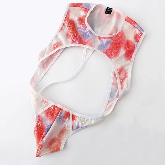 detail shot of red chestplate harness bodysuit with bold sculpted paneling and secure buckle shaping – pridevoyageshop.com – gay men’s harness, lingerie and fetish wear