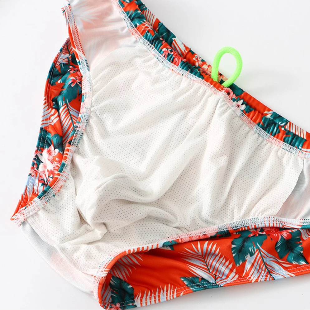 details of Orange Men’s Cockatoo Cove Swim Briefs - pridevoyageshop.com - gay men’s sexy swim briefs, trunks, board shorts, and bikinis