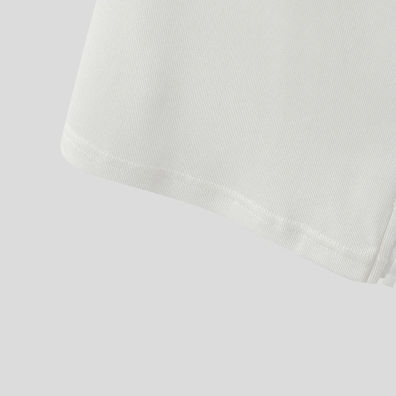 details of The Big Reveal Zip Tank in White laid flat showing zip front structure and stretch athletic fabric pridevoyageshopcom gay mens gym tank tops mesh tank tops activewear club tops fashion tops