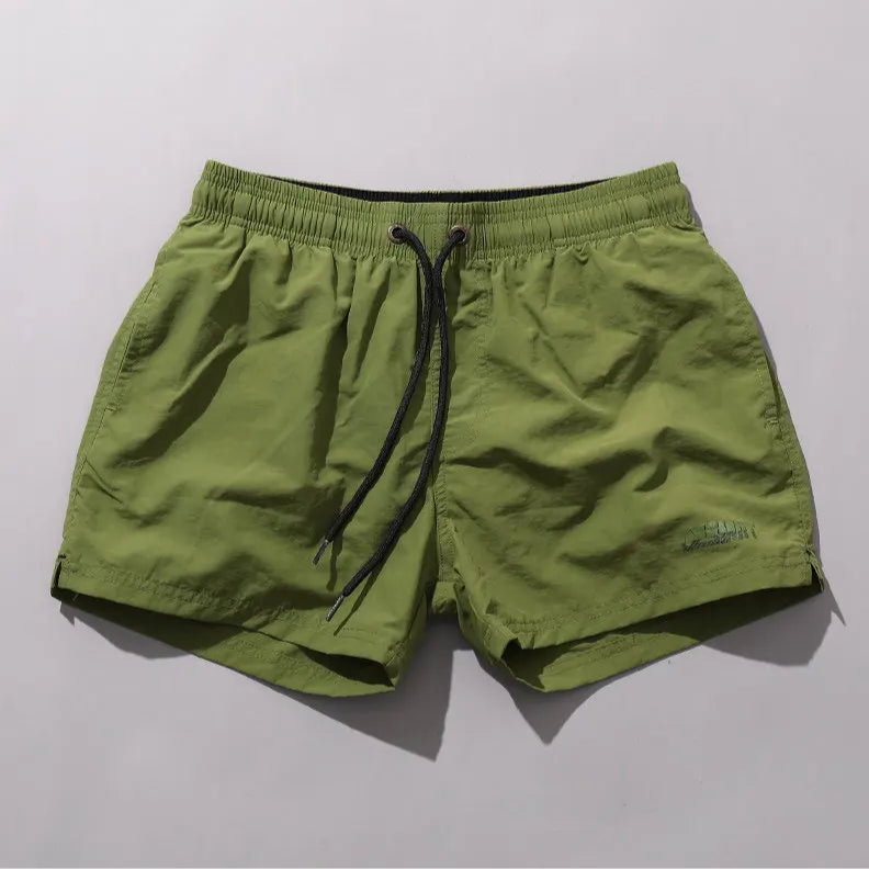 details of army green Desmiit Men’s Circuit Signal Swim Short – pridevoyageshop.com – gay men’s sexy swim briefs, trunks, board shorts, and bikinis