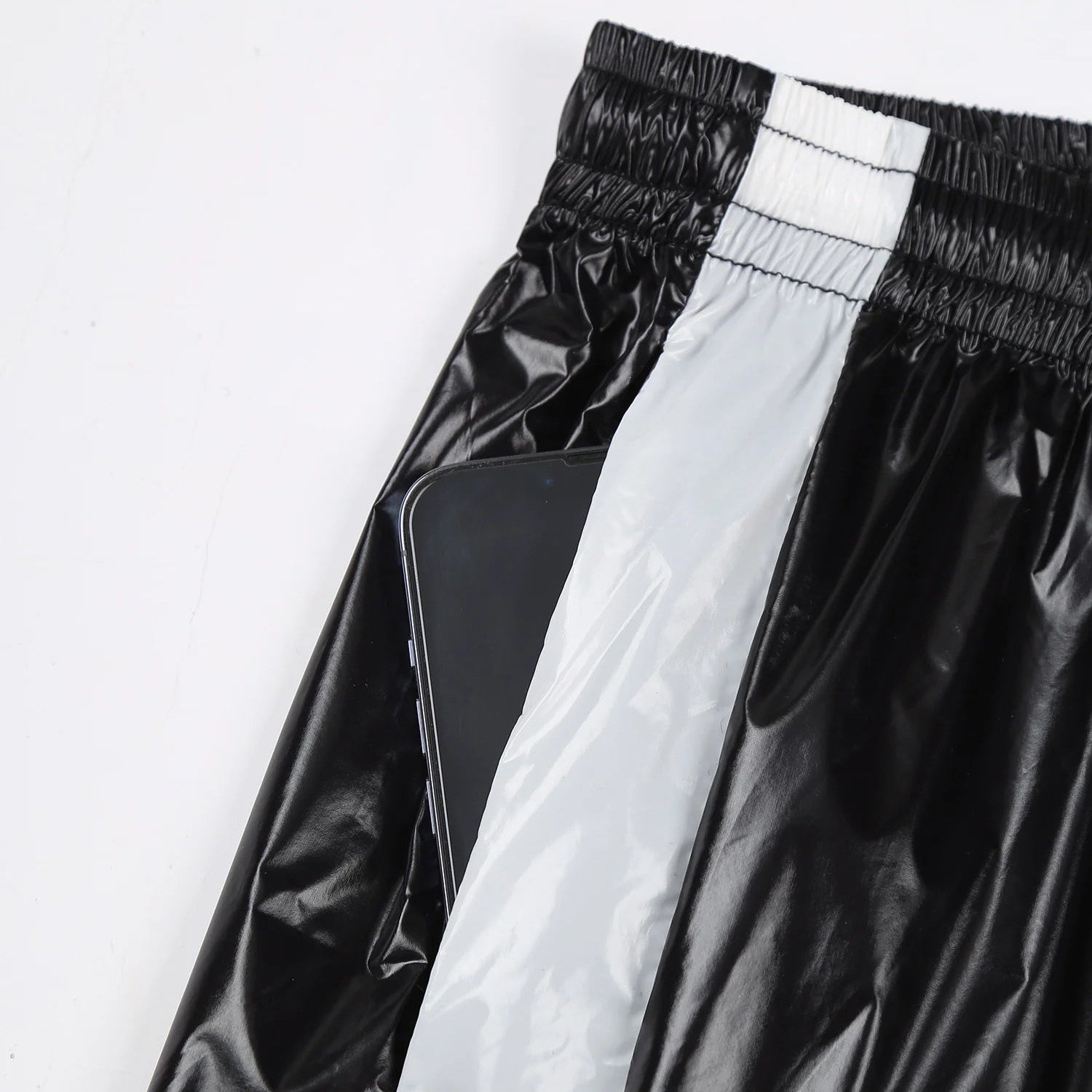 details of black Men’s Wet Look Lights Out Shorts – pridevoyageshop.com – gay men’s sexy swim briefs, trunks, board shorts, and bikinis