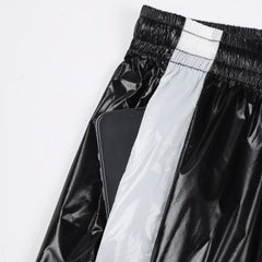 details of black Men’s Wet Look Lights Out Shorts – pridevoyageshop.com – gay men’s sexy swim briefs, trunks, board shorts, and bikinis