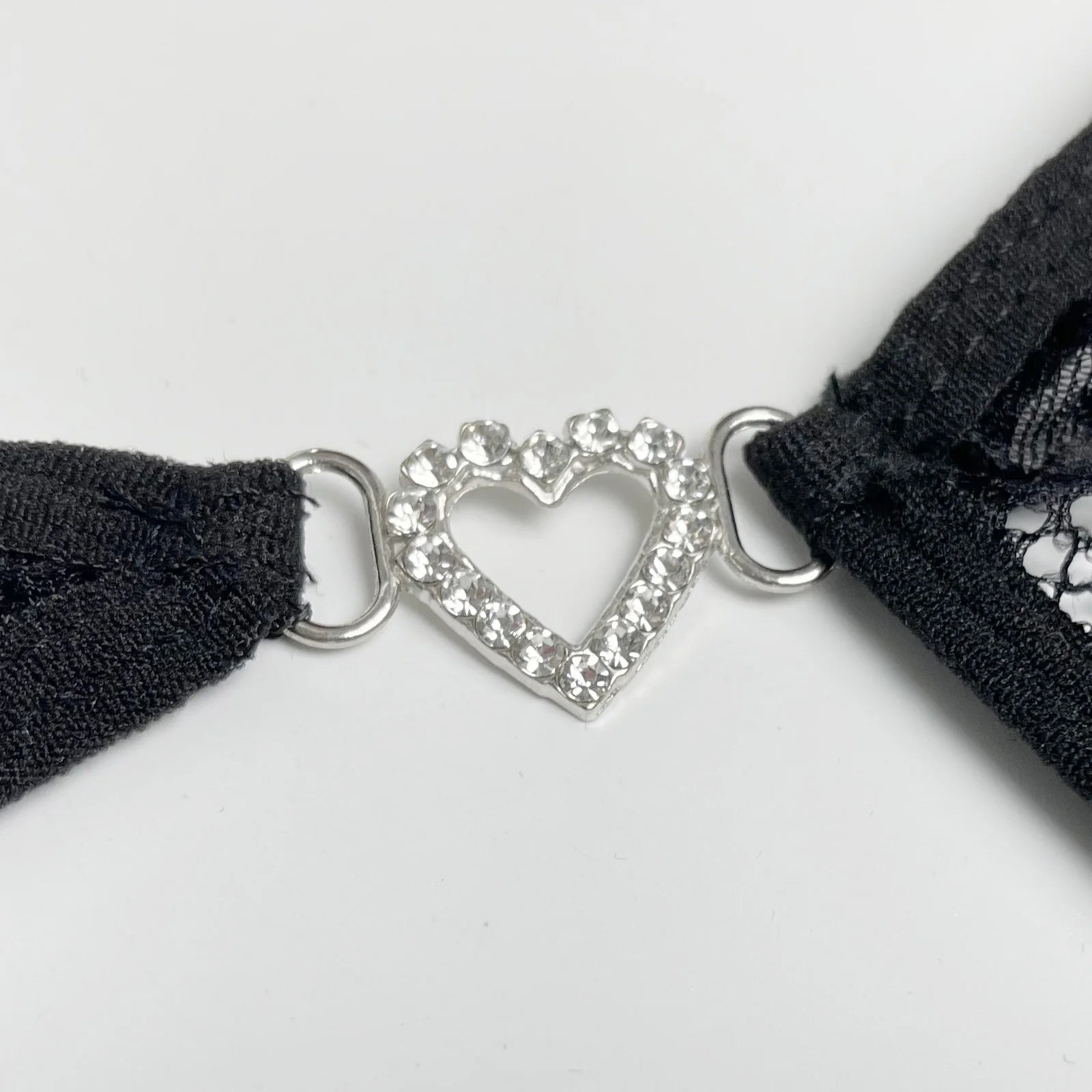 details of black Mother’s Boudoir Lace Teddy, floral lace fabric and deep neckline – pridevoyageshop.com – gay men’s harness, lingerie and fetish wear