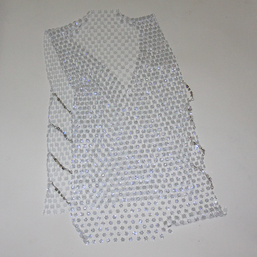 details of crystal net tank showing toned torso and sparkle mesh detailing – pridevoyageshop.com – gay men’s harness, lingerie and fetish wear