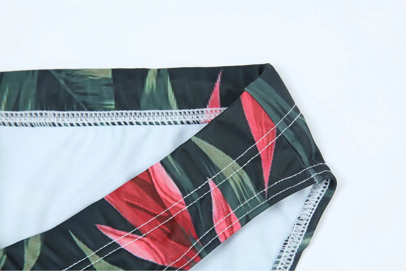 details of green leaf Men’s Rip Me Off Swim Briefs - pridevoyageshop.com - gay men’s sexy swim briefs, trunks, board shorts, and bikinis