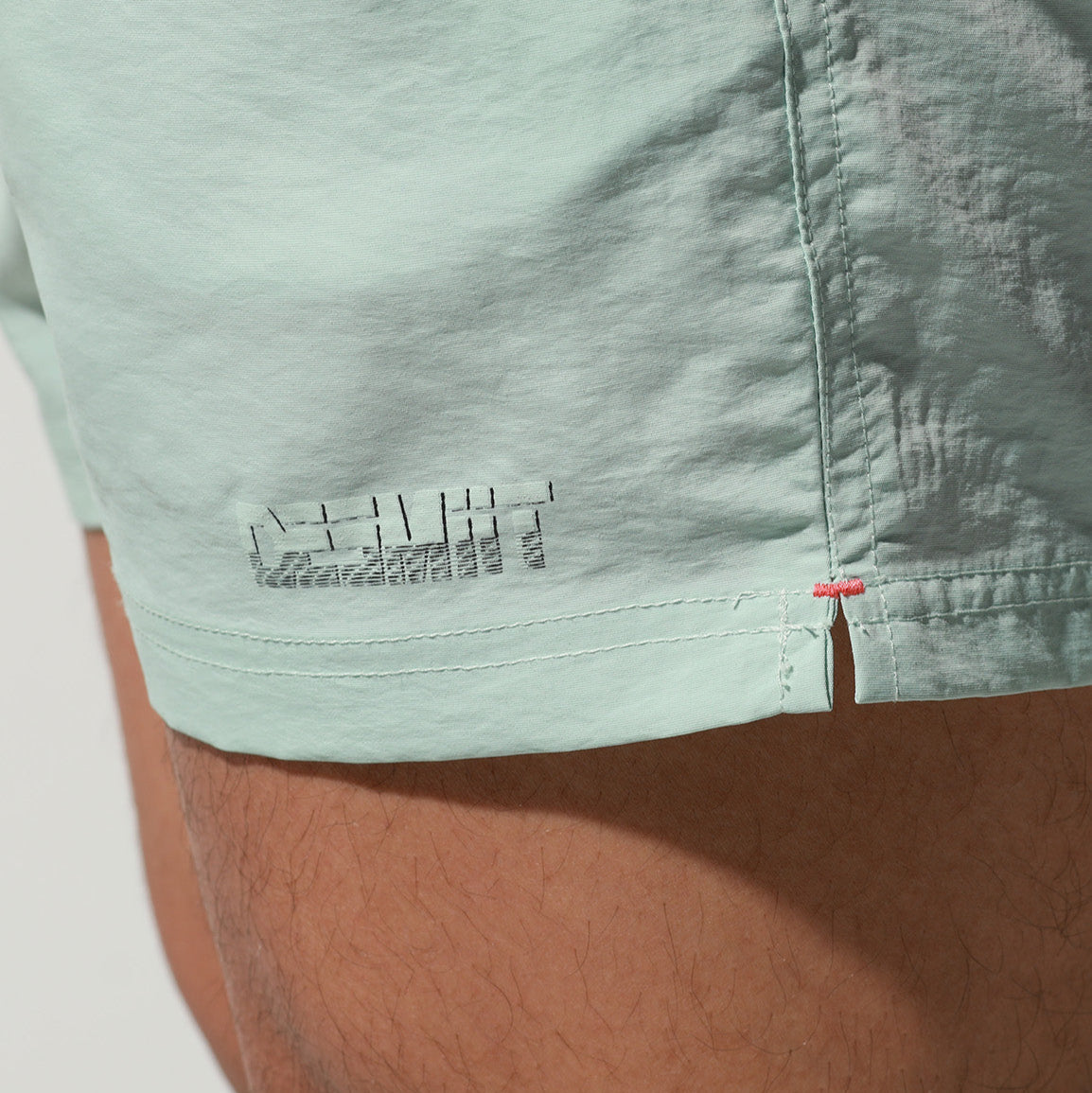 details of light blue Desmiit Men’s Circuit Signal Swim Short – pridevoyageshop.com – gay men’s sexy swim briefs, trunks, board shorts, and bikinis