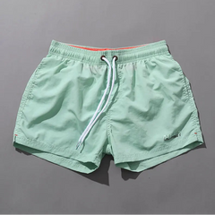 details of light blue Desmiit Men’s Circuit Signal Swim Short – pridevoyageshop.com – gay men’s sexy swim briefs, trunks, board shorts, and bikinis