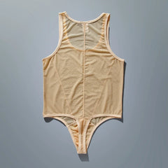 flat lay of apricot sheer mesh high-cut leotard showing see-through stretch fabric and elastic trim, apricot nude color – pridevoyageshop.com – gay men’s harness, lingerie and fetish wear