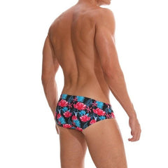 a hot gay man in Men's Pink Floral Swim Briefs - pridevoyageshop.com - gay men’s underwear and swimwear