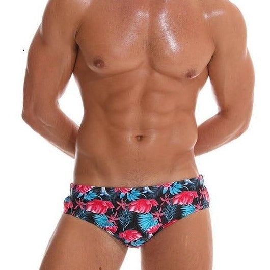 a hot gay man in Men's Pink Floral Swim Briefs - pridevoyageshop.com - gay men’s underwear and swimwear