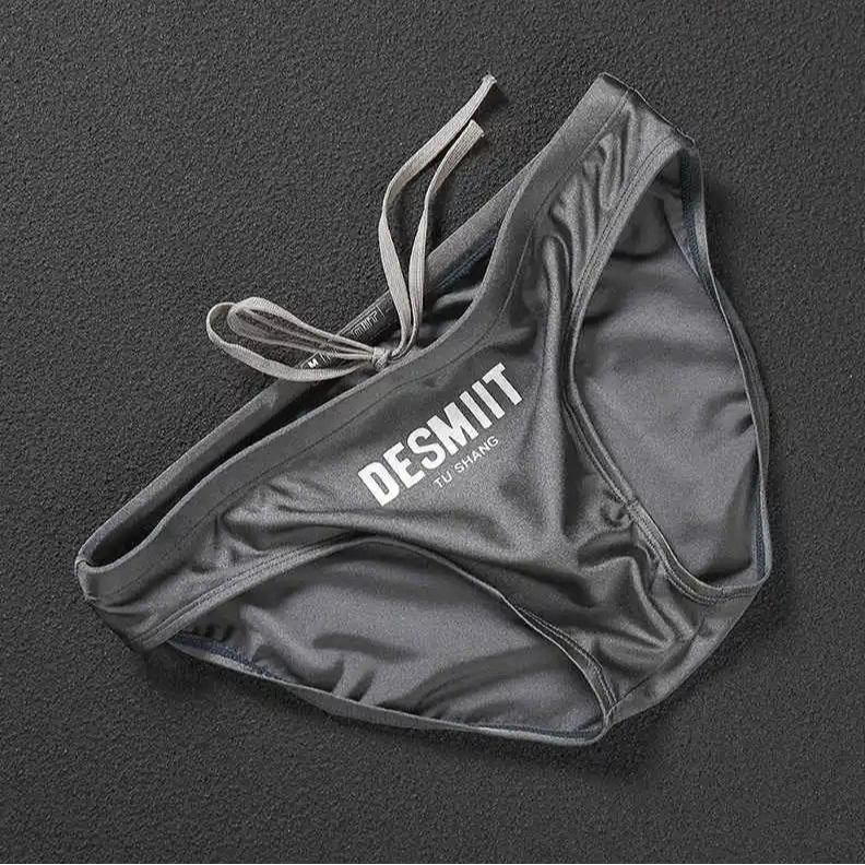 gray Desmiit Men’s Sleek Statement Swim Briefs - pridevoyageshop.com - gay men’s sexy swim briefs, trunks, board shorts, and bikinis