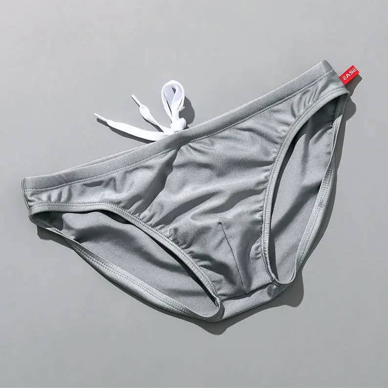 gray Men’s Tease-Me Minimal Swim Briefs - pridevoyageshop.com - gay men’s sexy swim briefs, trunks, board shorts, and bikinis