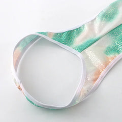 green Riot Cage Frame Singlet flat-lay showing chest cage straps and athletic singlet cut – pridevoyageshop.com – gay men’s harness, lingerie and fetish wear