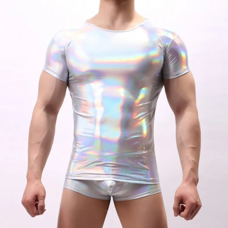 man wearing silver holographic metallic short sleeve tee indoors – pridevoyageshop.com – gay men’s gym tank tops mesh tank tops activewear clubwear fashion tops