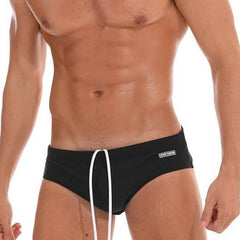 a sexy gay man in black Men's Classic Midnight Black Swim Briefs - pridevoyageshop.com - gay men’s underwear and swimwear