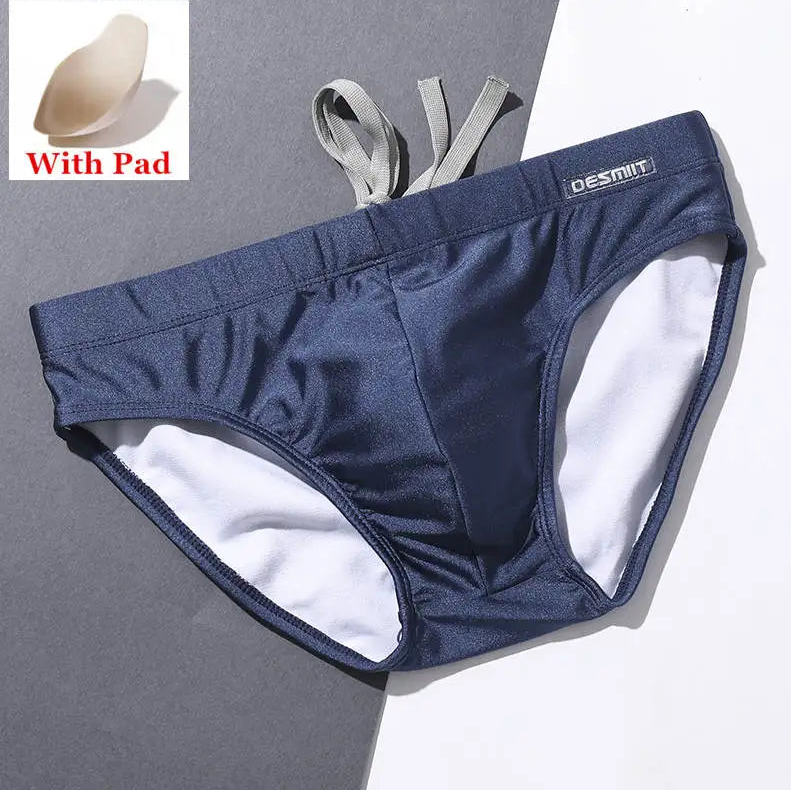 midnight blue Men’s Pool Plumper Padded Swim Briefs - pridevoyageshop.com - gay men’s sexy swim briefs, trunks, board shorts, and bikinis
