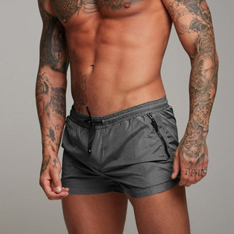 a hot gay man in dark gray Men's Solid Color Pocketed Running Shorts - pridevoyageshop.com - gay men’s underwear and swimwear