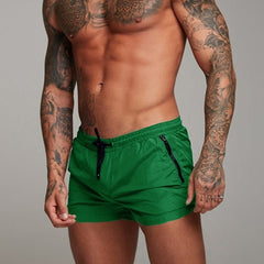 a hot gay man in green Men's Solid Color Pocketed Running Shorts - pridevoyageshop.com - gay men’s underwear and swimwear