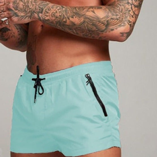 a hot gay man in light blue Men's Solid Color Pocketed Running Shorts - pridevoyageshop.com - gay men’s underwear and swimwear