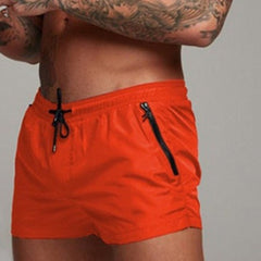 a hot gay man in orange Men's Solid Color Pocketed Running Shorts - pridevoyageshop.com - gay men’s underwear and swimwear