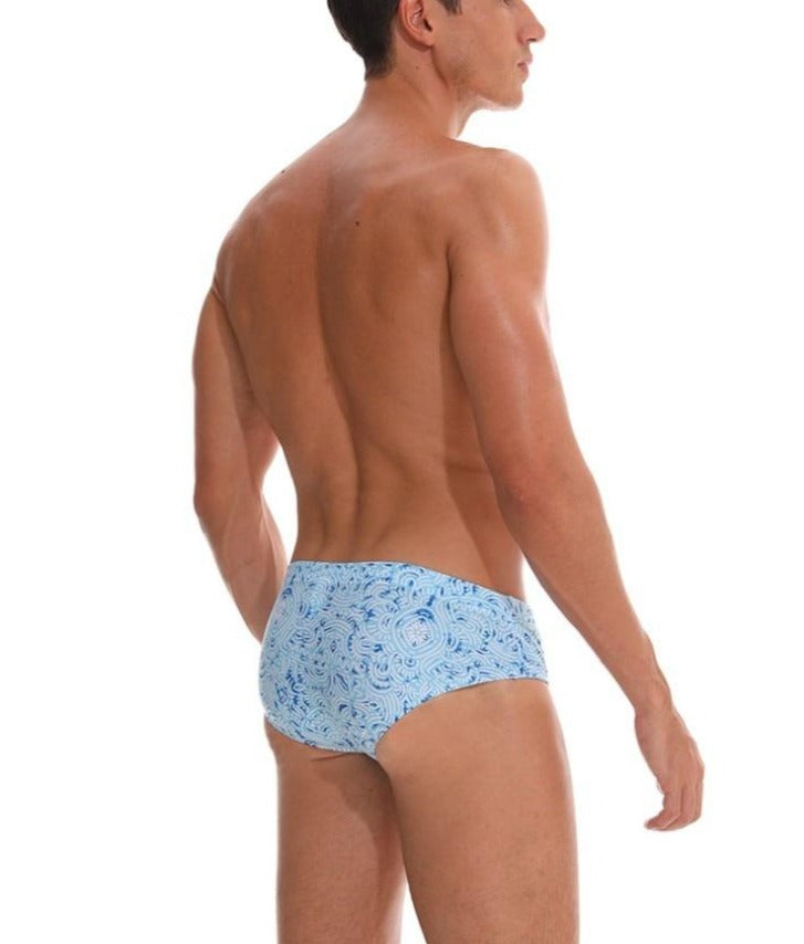 a sexy gay man in Men's Azure Paisley Swim Briefs - pridevoyageshop.com - gay men’s underwear and swimwear