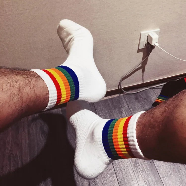 a sexy man in Rainbow Pride Crew Socks - pridevoyageshop.com - gay men's athletic socks, Pride rainbow crew socks