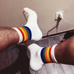 a sexy man in Rainbow Pride Crew Socks - pridevoyageshop.com - gay men's athletic socks, Pride rainbow crew socks