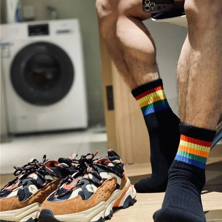 a sexy man in Rainbow Pride Crew Socks - pridevoyageshop.com - gay men's athletic socks, Pride rainbow crew socks