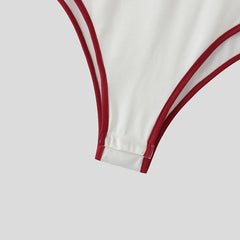 red Jock Fantasy Jersey Bodysuit flat lay with sporty mesh front and jock-back bottom – pridevoyageshop.com – gay men’s harness, lingerie and fetish wear