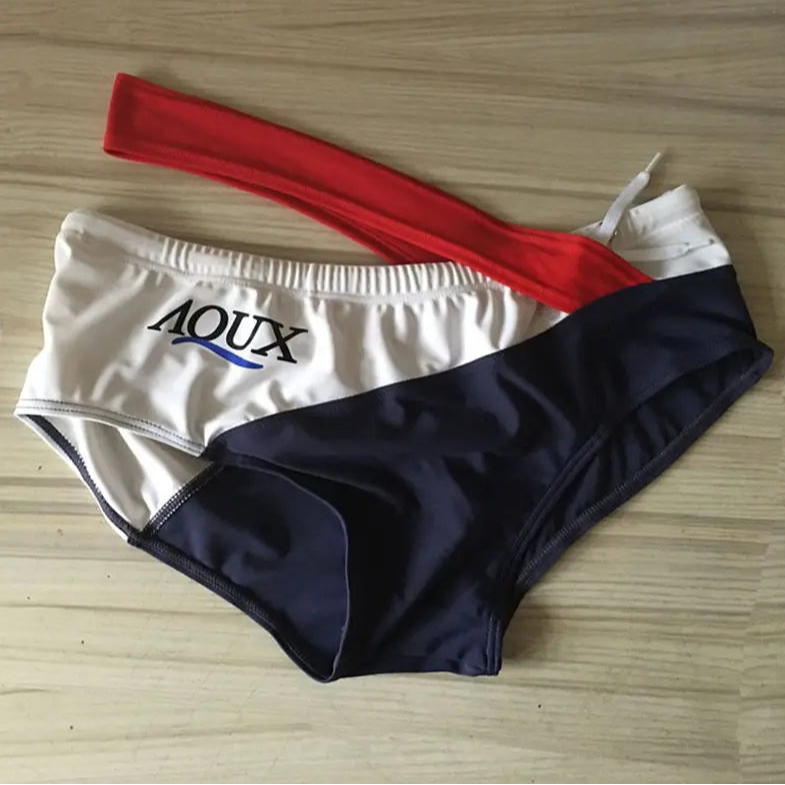 red Men’s Rebel Crossfire Low Rise Swim Briefs - pridevoyageshop.com - gay men’s sexy swim briefs, trunks, board shorts, and bikinis