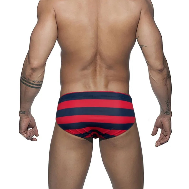 red Men’s Spank Me Striped Swim Briefs - pridevoyageshop.com - gay men’s sexy swim briefs, trunks, board shorts, and bikinis