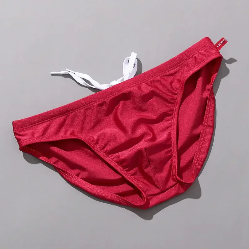 red Men’s Tease-Me Minimal Swim Briefs - pridevoyageshop.com - gay men’s sexy swim briefs, trunks, board shorts, and bikinis
