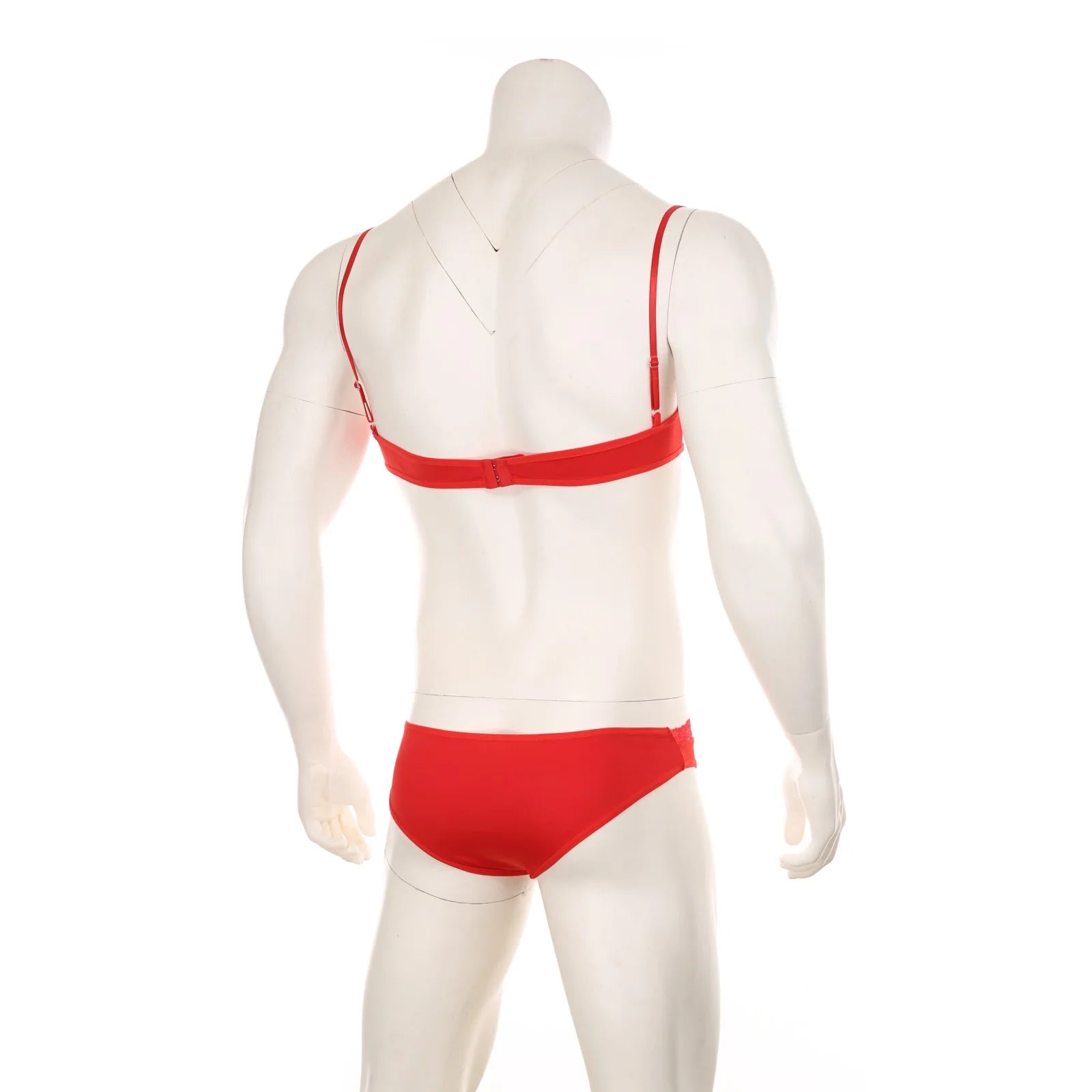 red lace Good Boy bralette and brief set laid flat, sheer sexy lace, soft cup bralette, low-rise lace brief – pridevoyageshop.com – gay men’s harness, lingerie and fetish wear