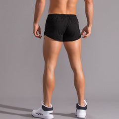 sexy gay man in black Gay Shorts | Ultra Short Running Shorts - Men's Activewear, gym short, sport shorts, running shorts- pridevoyageshop.com