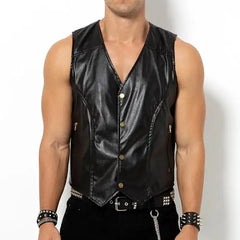 shirtless muscled gay man wearing a black barback glam vest mesh and faux leather club top standing in studio lighting showing chest shoulders and torso pridevoyageshopcom gay men’s gym tank tops mesh tank tops activewear clubwear fashion tops